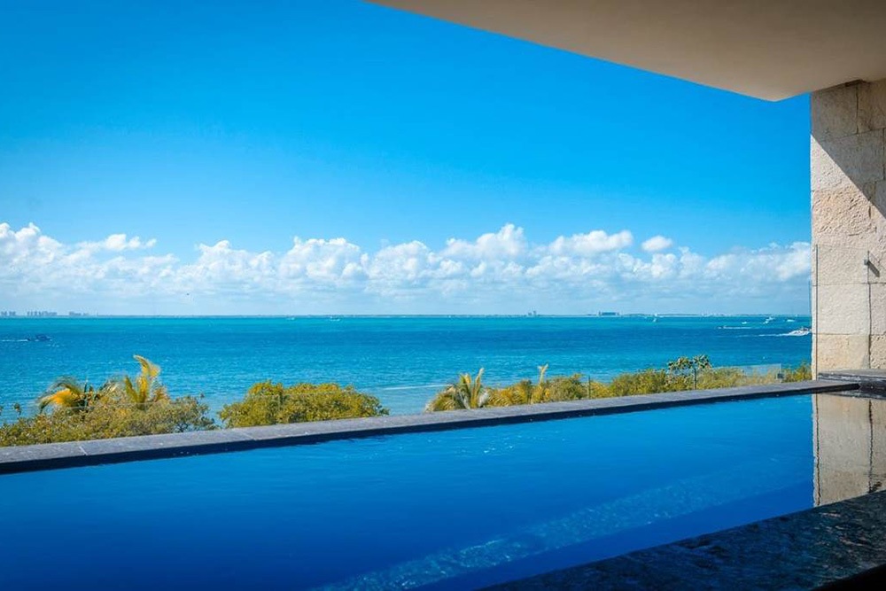 3rd Level Luxury Beachfront Condominium with Boat Slip Isla Mujeres
